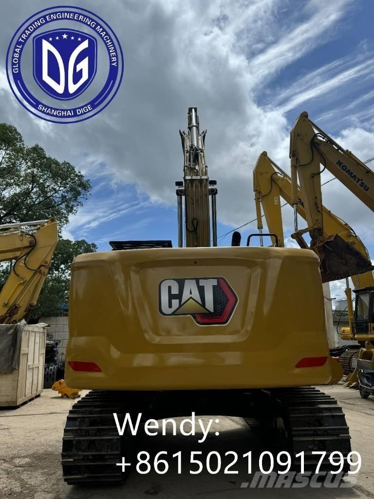 CAT 323 Bandgrävare