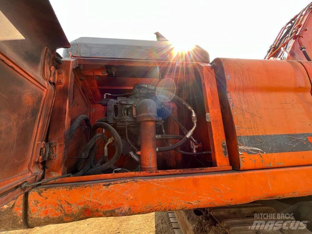 Doosan DX 480 LC Bandgrävare