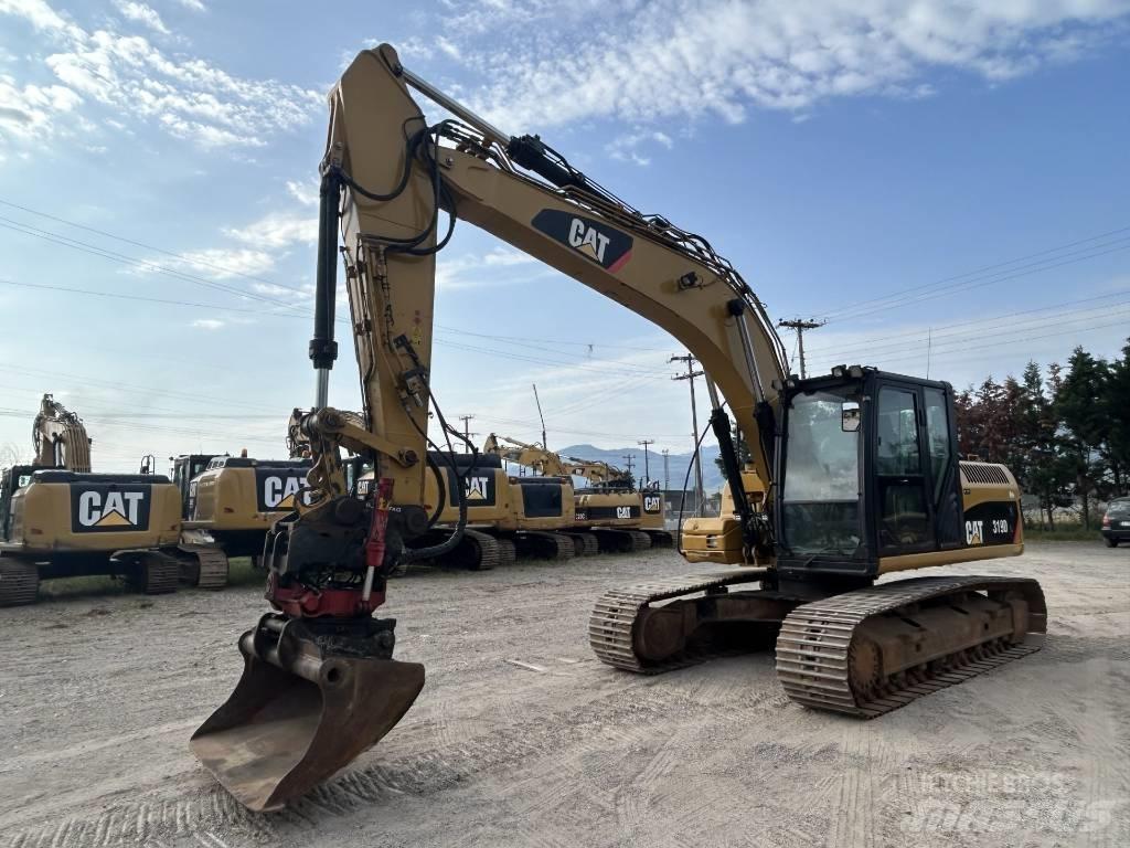 CAT 319 D L Bandgrävare