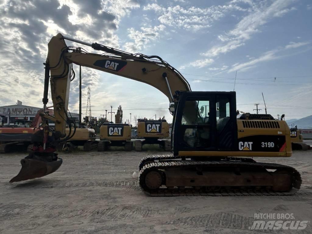 CAT 319 D L Bandgrävare