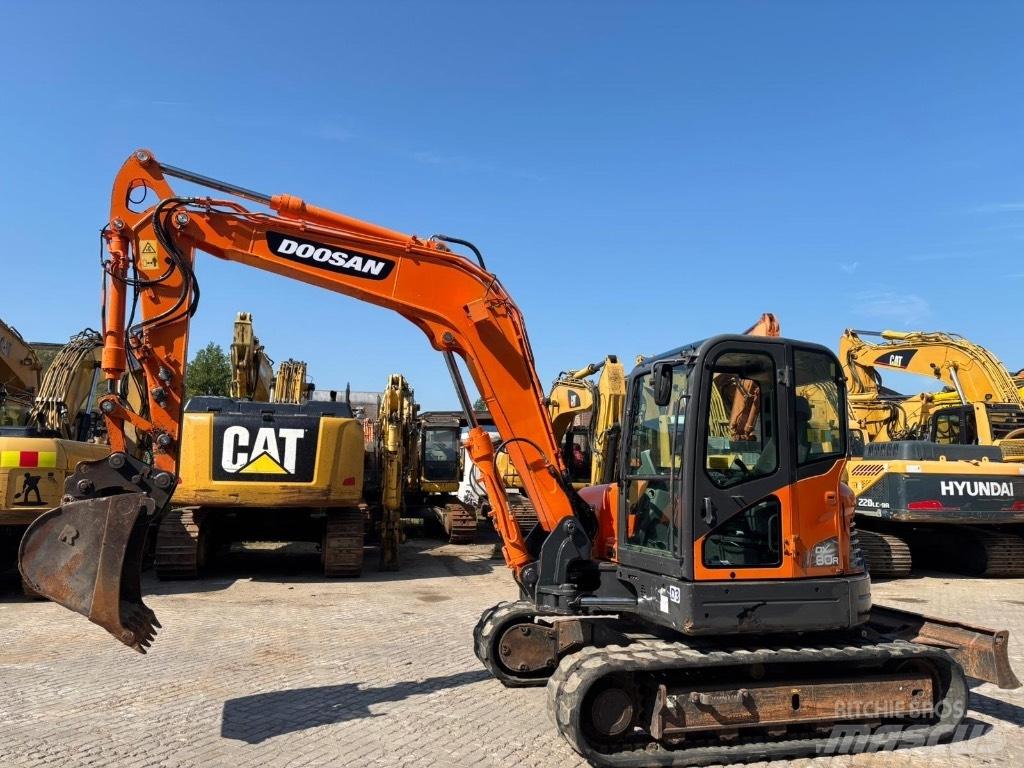 Doosan DX 80 R Midigrävmaskiner 7t - 12t