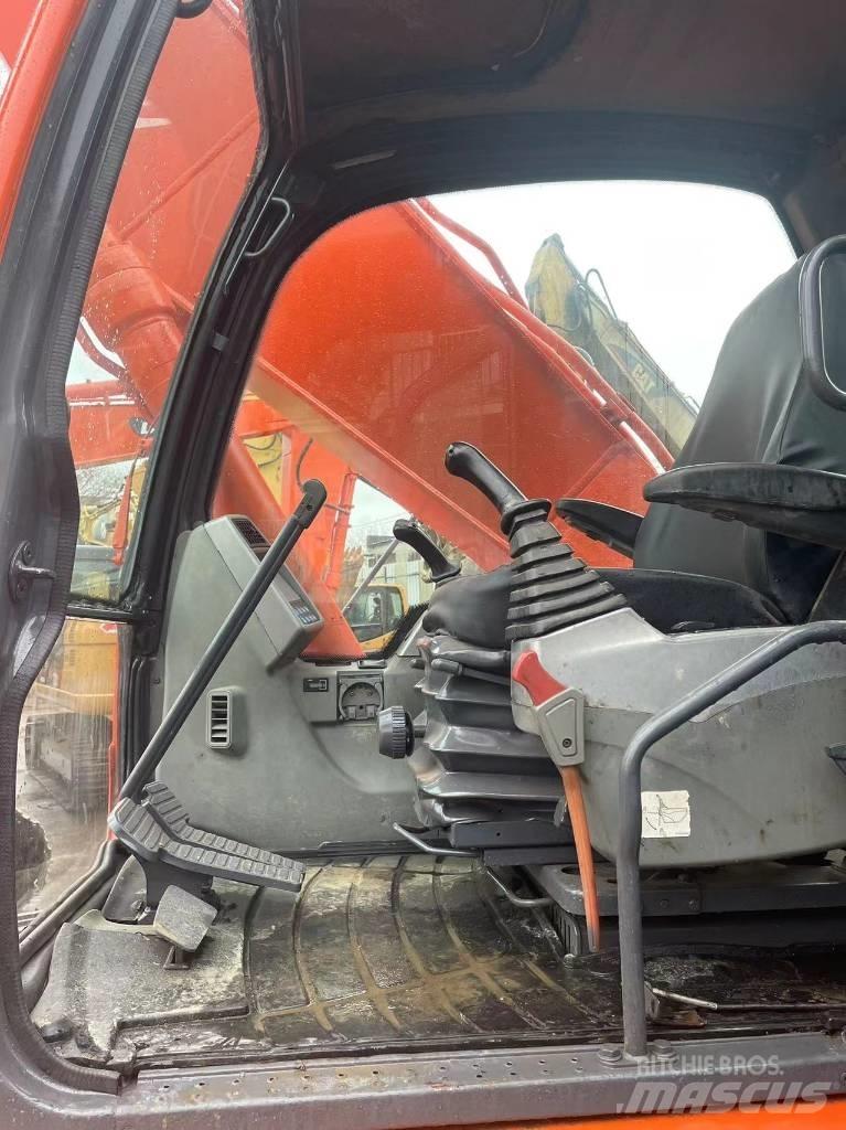 Doosan dx225 Bandgrävare