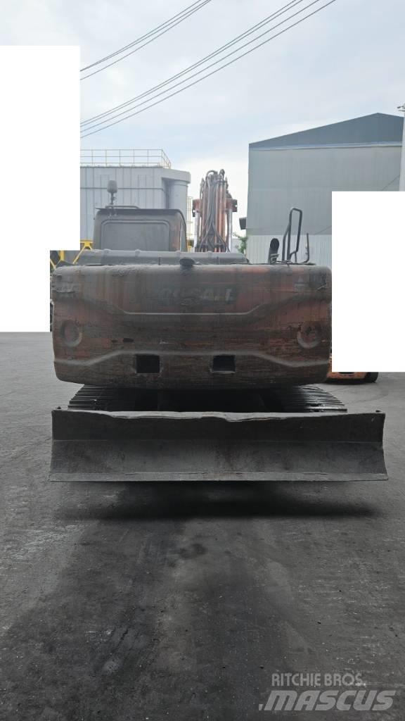 Doosan DX 140 LC Bandgrävare