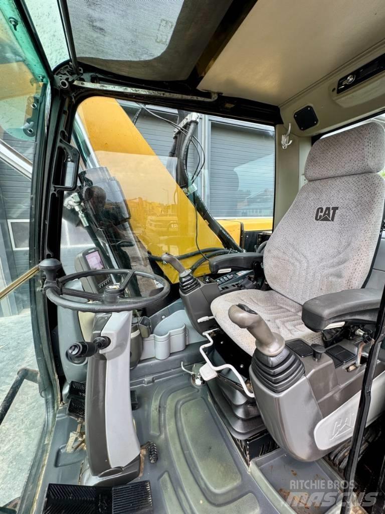 CAT M322D Hjulgrävare