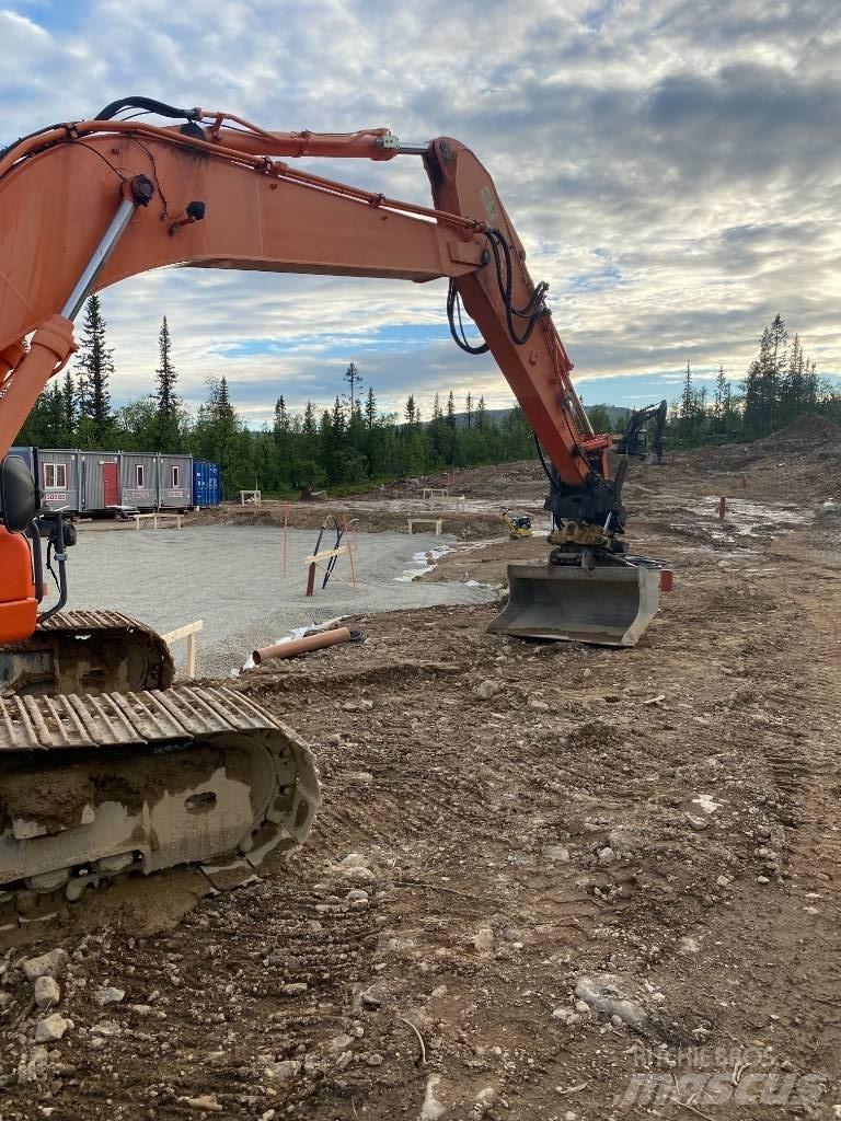 Doosan DX 255 Bandgrävare