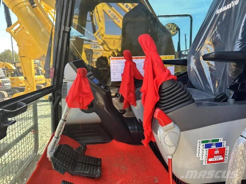 Komatsu PC 210-8 Bandgrävare