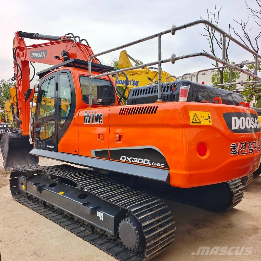 Doosan DX 225 LC Bandgrävare
