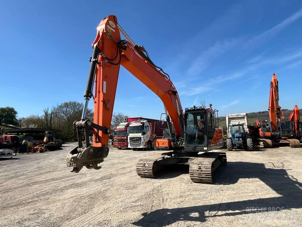 Doosan DX 225 Bandgrävare
