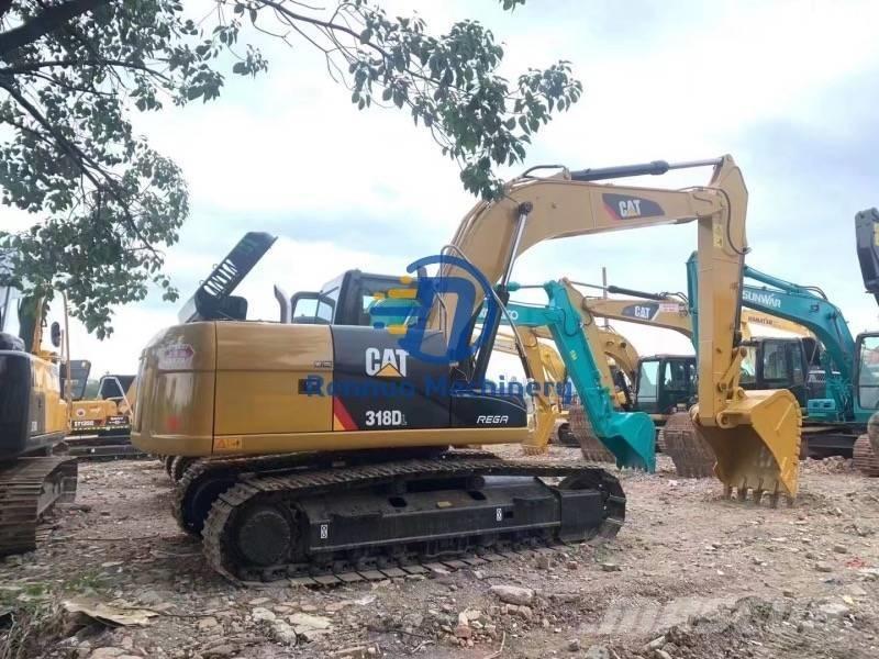 CAT 318DL Bandgrävare