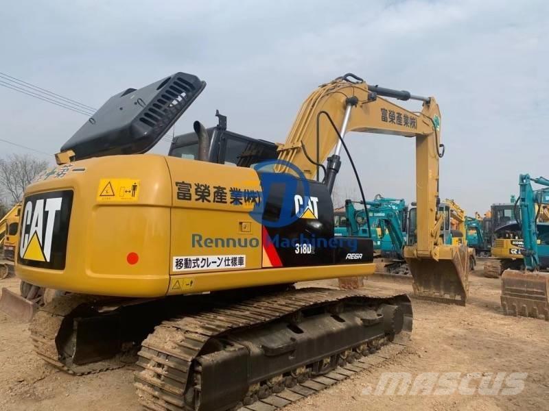 CAT 318DL Bandgrävare