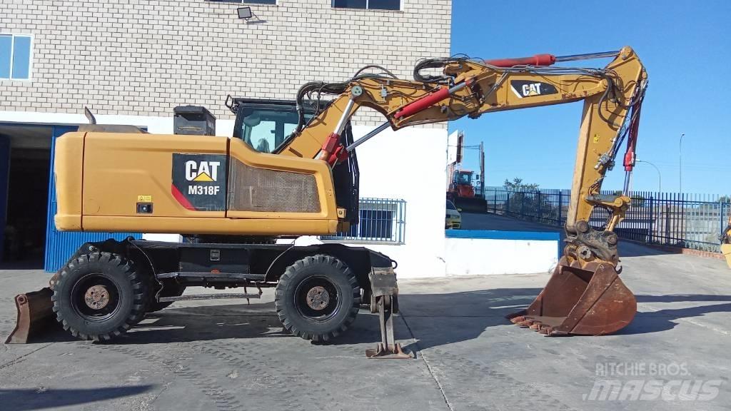 CAT M318F Hjulgrävare