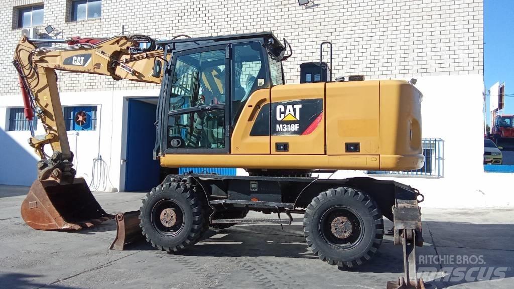 CAT M318F Hjulgrävare