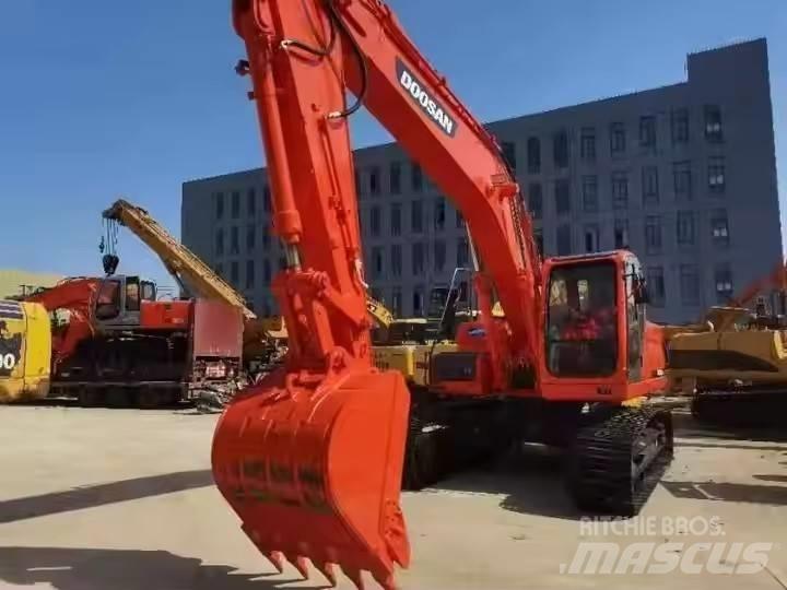 Doosan DX225LC Bandgrävare