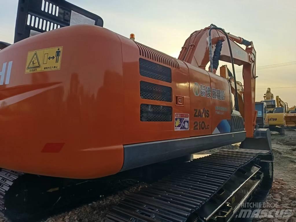 Hitachi ZX210LC Bandgrävare