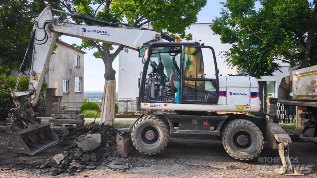 CAT 313 D Hjulgrävare