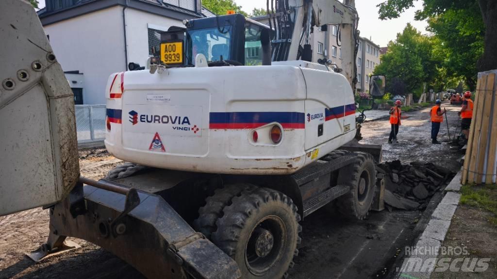 CAT 313 D Hjulgrävare