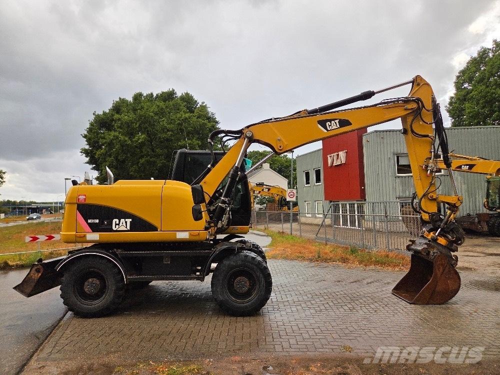 CAT M313D Hjulgrävare