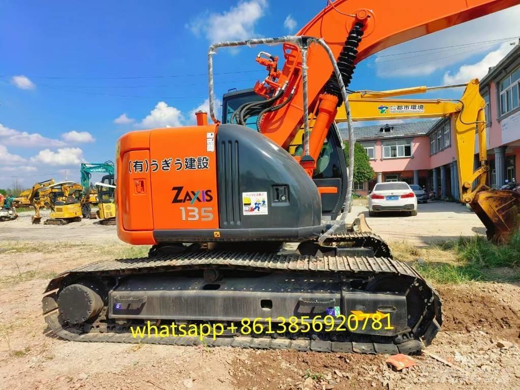 Hitachi ZX 135 US Bandgrävare