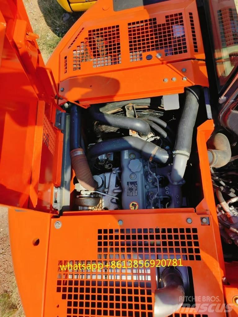 Hitachi ZX 135 US Bandgrävare