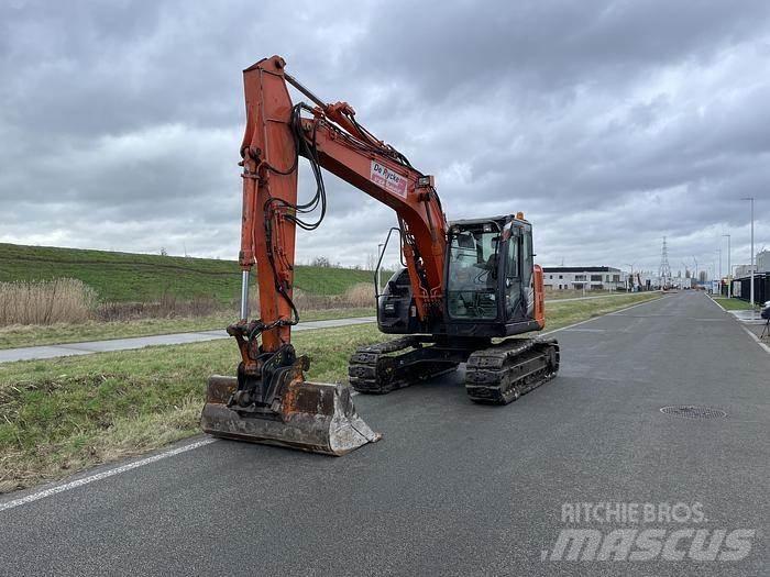 Hitachi ZX135US-5B Bandgrävare