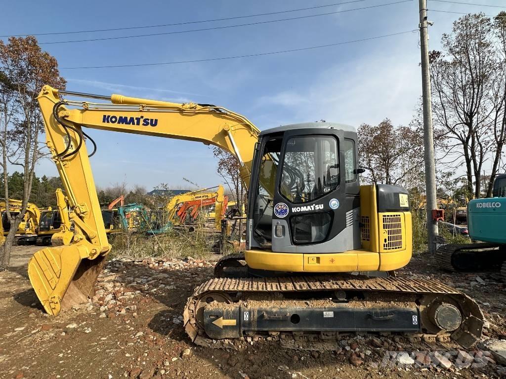 Komatsu PC 128 US Bandgrävare