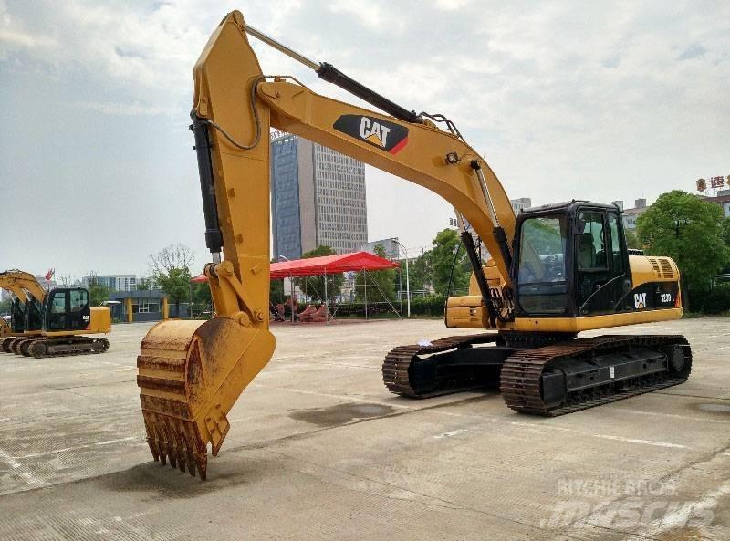 CAT 323 Bandgrävare
