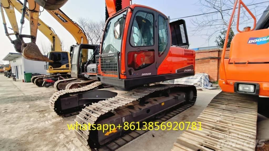 Doosan DX 225 Bandgrävare