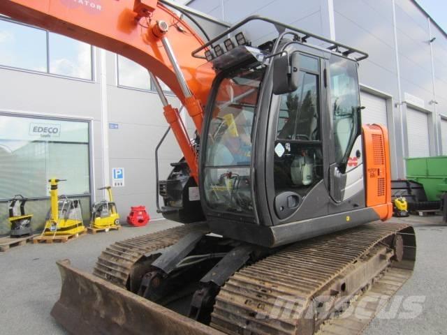 Hitachi ZX 135 Bandgrävare