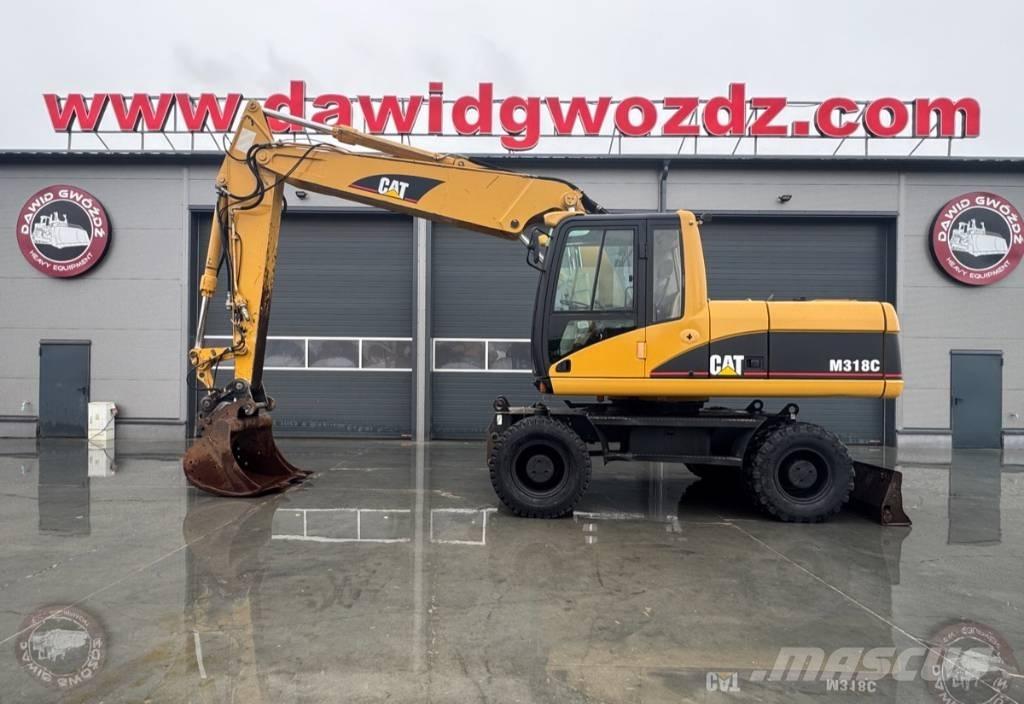 CAT M 318 C Hjulgrävare