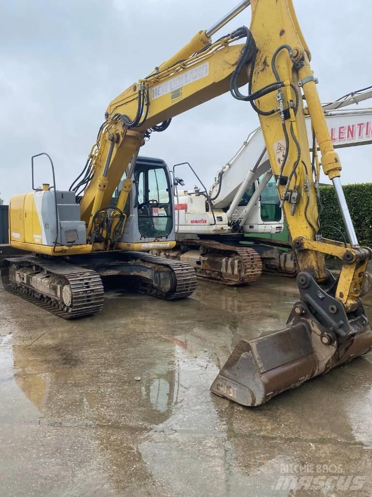 New Holland E 145 Bandgrävare