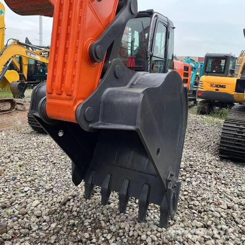 Doosan DX 225 Bandgrävare