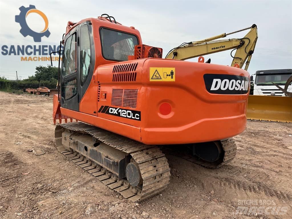 Doosan DX 120 Bandgrävare