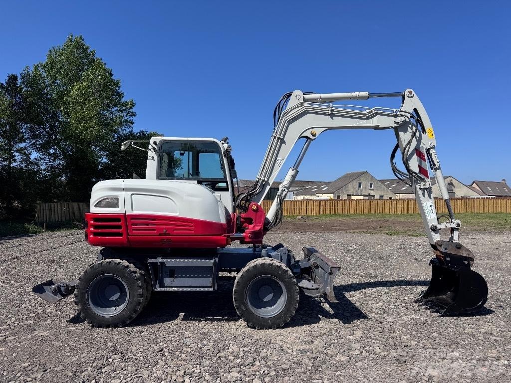 Takeuchi TB 295 W Hjulgrävare