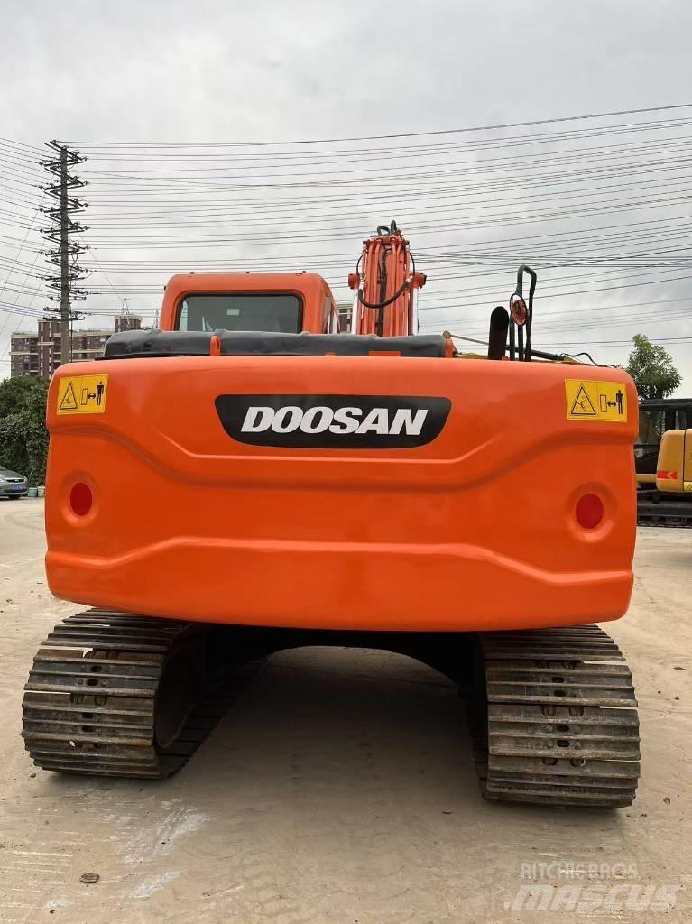 Doosan DX 140 Bandgrävare