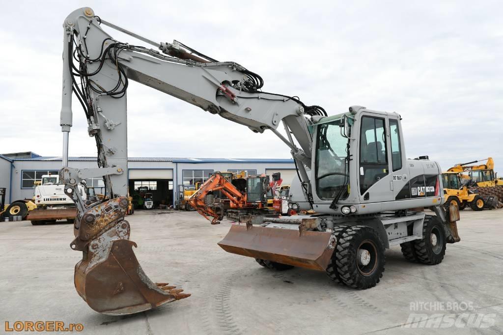 CAT M 313 D Hjulgrävare