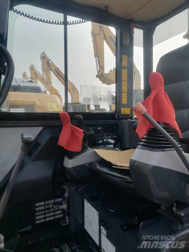 Komatsu PC56-7 Bandgrävare