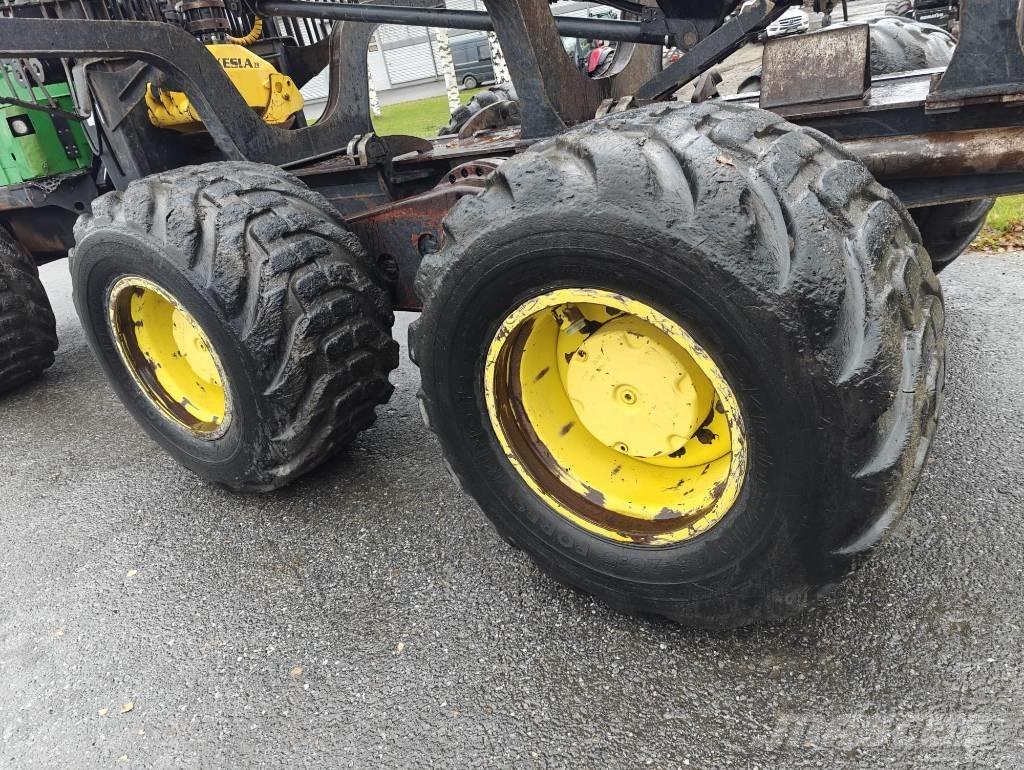 John Deere 1210 E Skotare