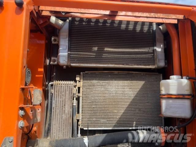 Doosan DX 225 LC Bandgrävare