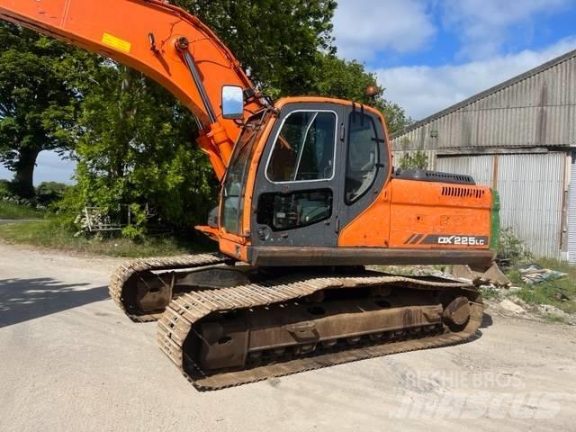 Doosan DX 225 LC Bandgrävare