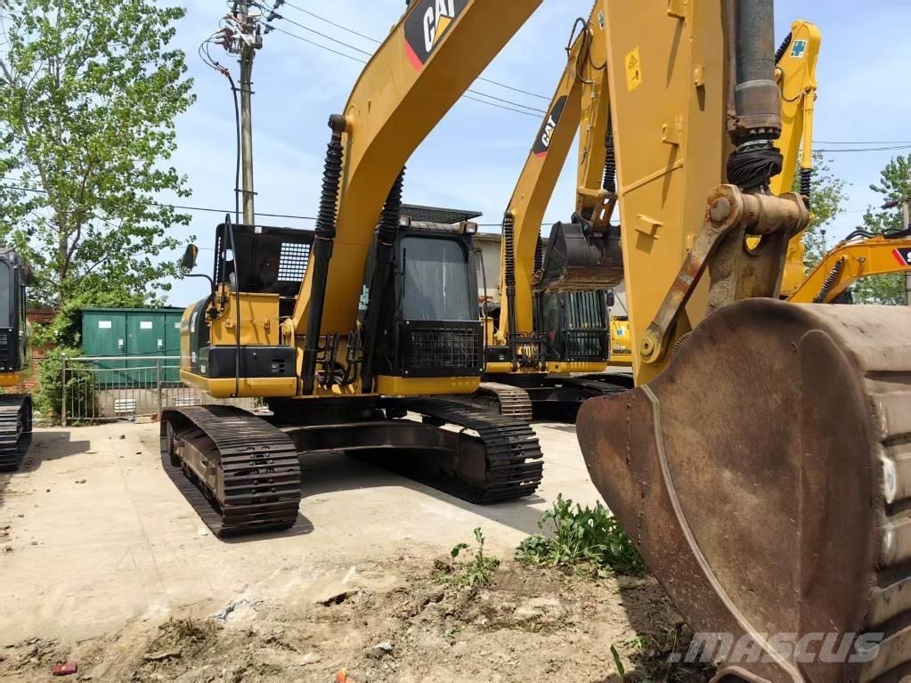 CAT 323 D Bandgrävare