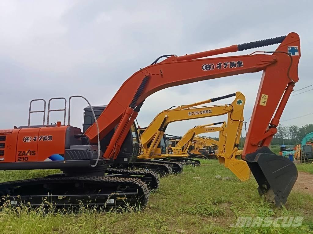 Hitachi ZX 210 Bandgrävare