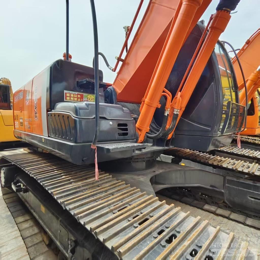 Hitachi ZX 210 Bandgrävare
