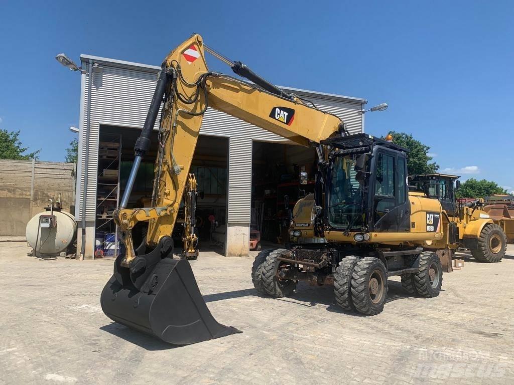 CAT M 318 D Hjulgrävare