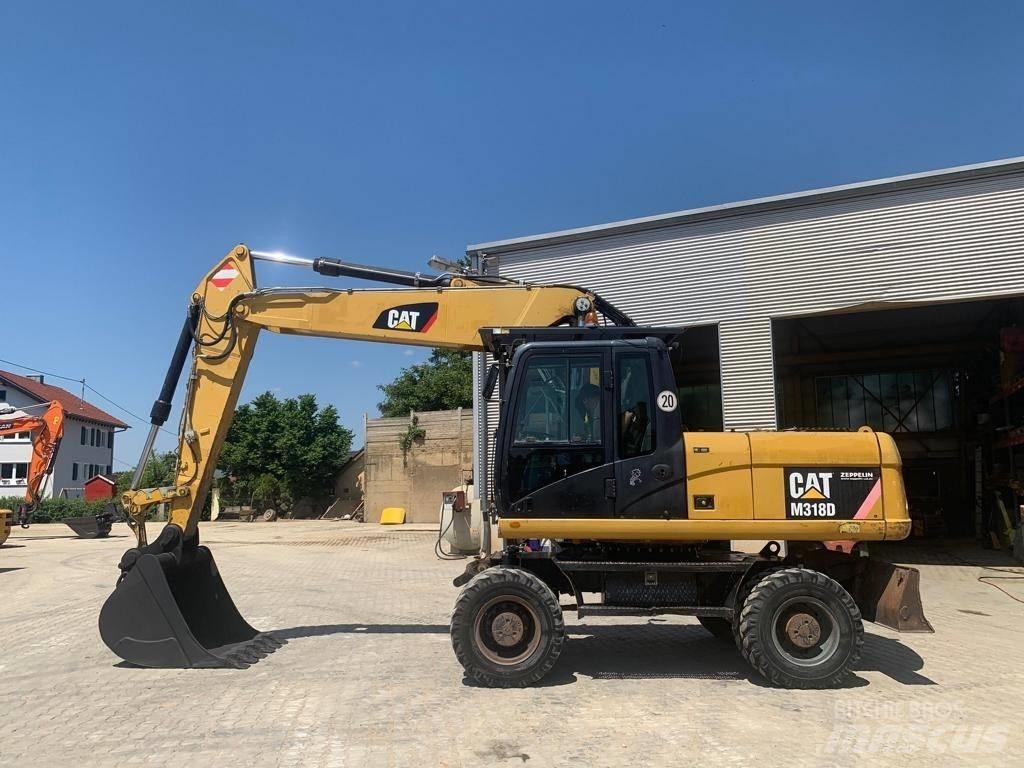 CAT M 318 D Hjulgrävare