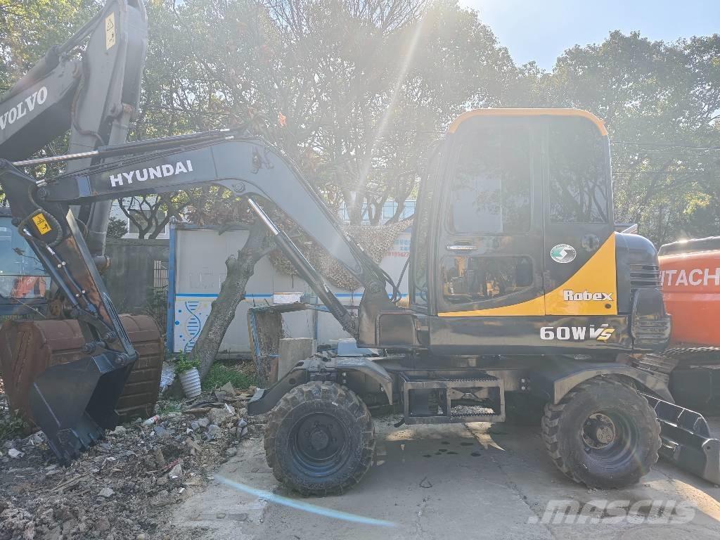 Hyundai 60 W VS Minigrävare < 7t