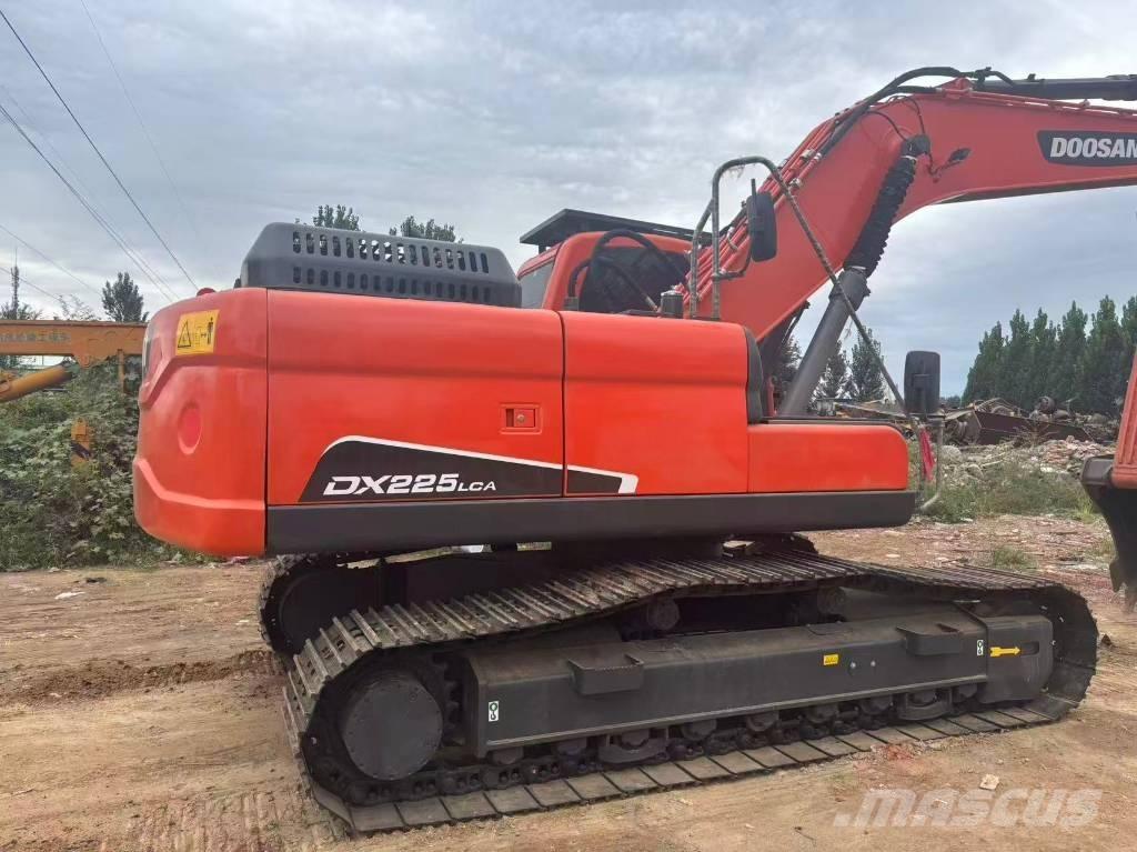 Doosan DX 225 Bandgrävare