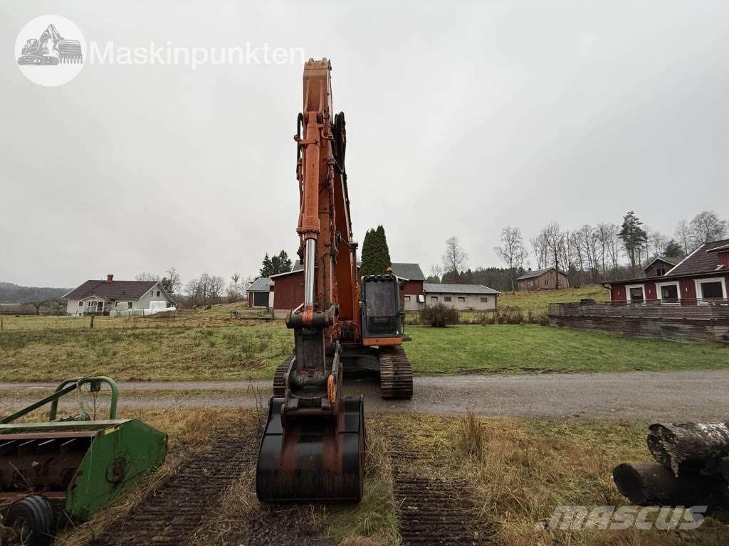 Doosan DX 225 LC Bandgrävare
