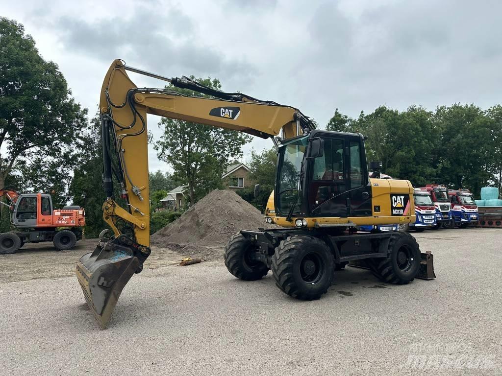 CAT M 313 D Hjulgrävare