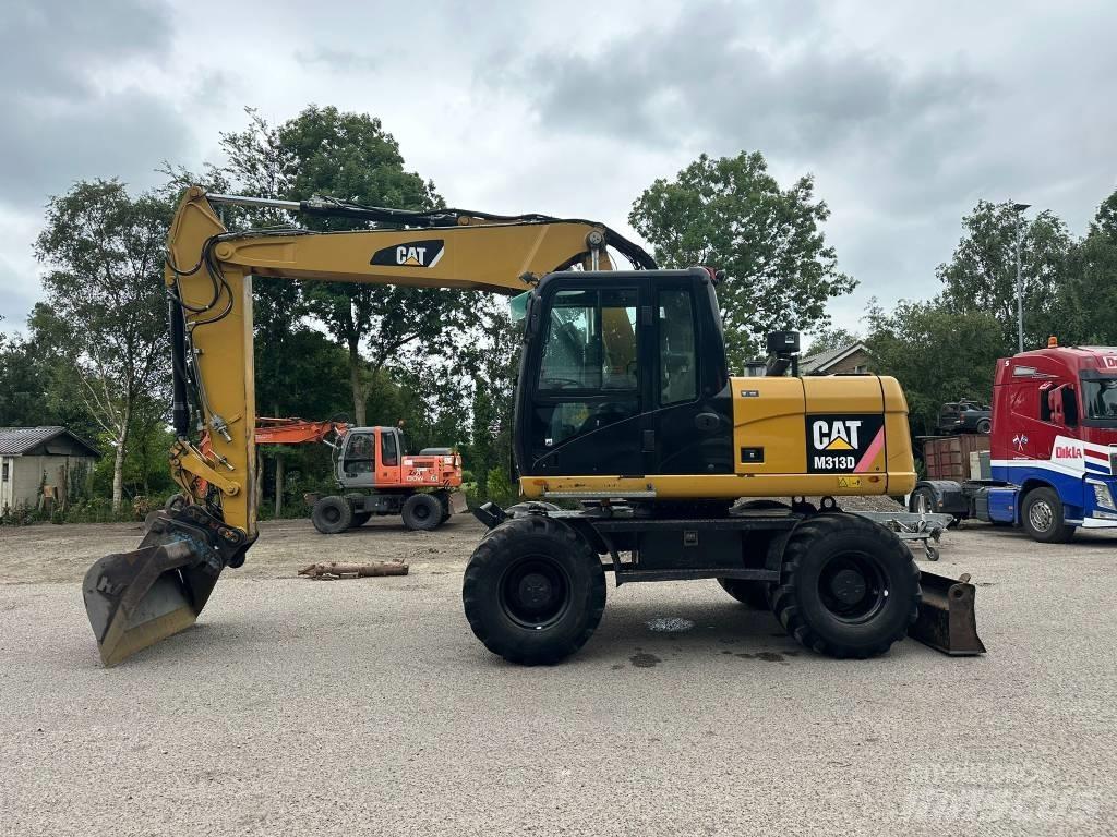 CAT M 313 D Hjulgrävare