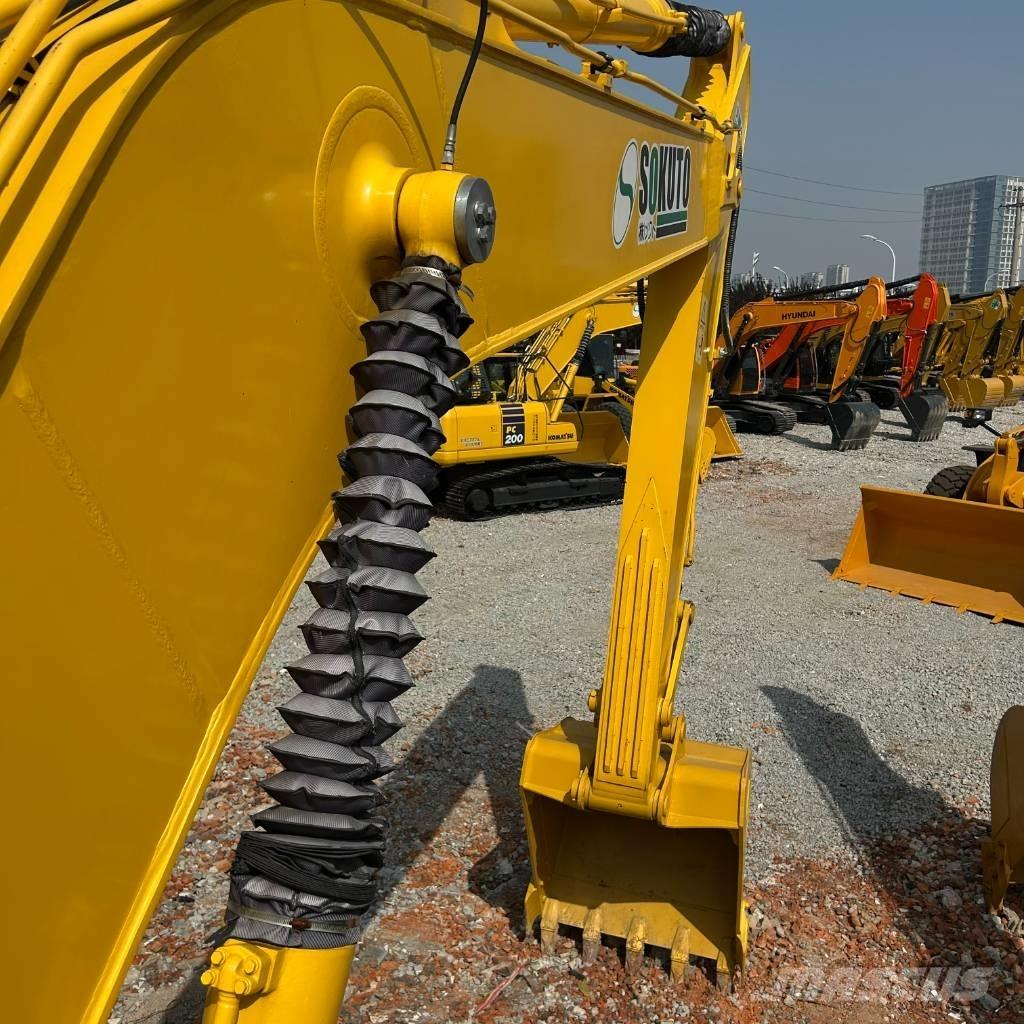 Komatsu 210-8 Bandgrävare